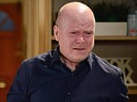 WARNING: Embargoed for publication until 00:00:01 on 10/05/2016 - Programme Name: EastEnders - TX: 19/05/2016 - Episode: EastEnders April - June 2016 - 5287 (No. n/a) - Picture Shows: +HOLD BACK FOR COMS+ Phil is devasted by Peggy's death as Sharon tries to comfort him. Sharon Mitchell (LETITIA DEAN), Phil Mitchell (STEVE MCFADDEN) - (C) BBC - Photographer: Kieron McCarron