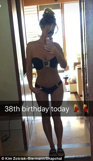'38th birthday today!' Zolciak-Biermann's birthday suit was a black strapless bikini featuring gold detailing