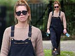 (EXCLUSIVE PICTURES ALL ROUND MINIMUM REPRO £250.00 PER PICTURE) Actress Billie Piper wearing a beige top, dungarees and a pair of Chloe Susanna Studded Leather Buckle Boots spotted out and about in London, UK. 19/05/2016 ..BYLINE MUST READ : JAMESY/GOTCHA IMAGES....Copyright by © Gotcha Images Ltd. All rights reserved...Usage of this image is conditional upon the acceptance ..of Gotcha Images Ltd, terms and conditions available at..www.gotchaimages.com