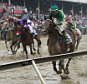 May 21, 2016; Baltimore, MD, USA; Kent Desormeaux aboard Exaggerator (5) wins during the 141st running of the Preakness Stakes at Pimlico Race Course. Mandatory Credit: Tommy Gilligan-USA TODAY Sports