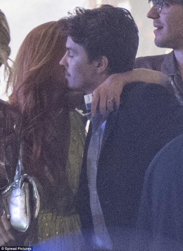 Smitten kittens: They reportedly became engaged after he popped the question last month and Lindsay Lohan did little to dispel rumours as she put on a loved-up display with boyfriend Egor Tarabasov while dining at the Carlton restaurant in Cannes on Friday evening