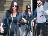 Exclusive... 52066392 Pregnant Megan Fox was spotted grabbing lunch at Cafe Grattitude in bright and sunny Los Angeles, California on May 20, 2016 with her husband, Brian Austin Green. Megan and Brian are currently trying to work things out with their struggling relationship, and Brian was seen trying to prevent Megan from being photographed by unsuccessfully covering her with an umbrella. ***NO WEB USE W/O PRIOR AGREEMENT - CALL FOR PRICING*** FameFlynet, Inc - Beverly Hills, CA, USA - +1 (310) 505-9876