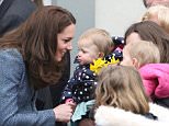 The Duchess of Cambridge talks to wellwishers as she arrives to open a new charity shop for the East Anglia's Children's Hospices in Holt, Norfolk.