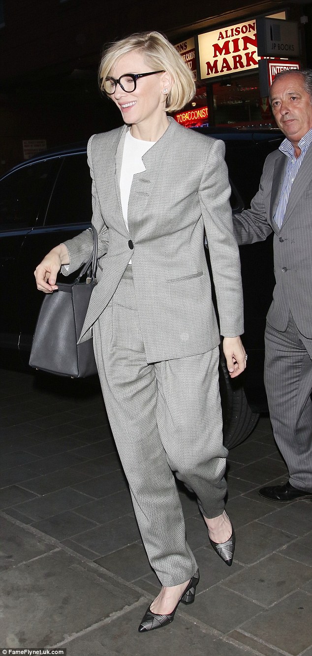 Beaming: Cate was on fine form during her night on the town, flashing a big grin as she made her way home 