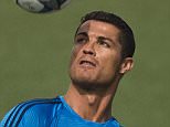 Real Madrid Cristiano Ronaldo plays with a ball during a training session ahead of Saturday's Champions League soccer match final between Atletico de Madrid and Real Madrid, at the Valdebebas stadium in Madrid, Spain, Tuesday, May 24, 2016 . (AP Photo/Daniel Ochoa de Olza)