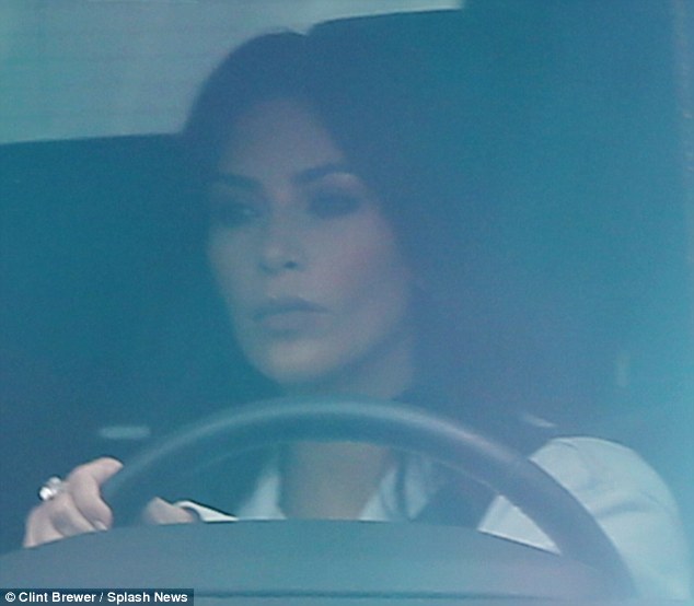 In the driver's seat: As always, the 35-year-old reality star sported a full face of make-up, and she wore her raven locks down for her drive