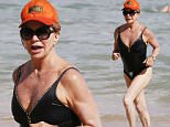 *PREMIUM EXCLUSIVE* Oahu, HI - Goldie Hawn is spotted taking a dip in the warm waters while in Oahu. The actress looks fit and toned as she walks from the shore back to the sand. She shows off her great physique and proves that you can look good at any age. She was sure to protect her face by wearing an orange cap and sunglasses. \nAKM-GSI        May 20, 2016\nTo License These Photos, Please Contact :\nSteve Ginsburg\n(310) 505-8447\n(323) 423-9397\nsteve@akmgsi.com\nsales@akmgsi.com\nor\nMaria Buda\n(917) 242-1505\nmbuda@akmgsi.com\nginsburgspalyinc@gmail.com