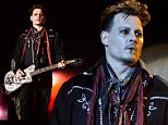 Johnny Depp, guitarist of US band Hollywood Vampires, performs at the Rock in Rio Lisboa music festival at Bela Vista Park in Lisbon on May 27, 2016. Rock in Rio runs from May 19 to May 29, 2016.  / AFP PHOTO / PATRICIA DE MELO MOREIRAPATRICIA DE MELO MOREIRA/AFP/Getty Images