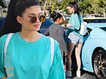 Malibu, CA - Kylie Jenner wears turquoise blue for a shopping trip to Planet Blue in Malibu. The young reality star got some help with her shopping bags to turquoise blue Ferrari.\nAKM-GSI   May  27, 2016\n \nTo License These Photos, Please Contact :\n \nSteve Ginsburg\n(310) 505-8447\n(323) 423-9397\nsteve@akmgsi.com\nsales@akmgsi.com\nor\nMaria Buda\n(917) 242-1505\nmbuda@akmgsi.com\nginsburgspalyinc@gmail.com