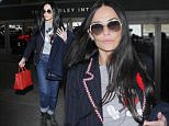 Los Angeles, CA - Demi Moore dons a cute Mickey Mouse tee as she returns to her beloved Los Angeles after shinning on the red carpet for Vogue's Centenary gala dinner.\nAKM-GSI       May 27, 2016\nTo License These Photos, Please Contact :\nSteve Ginsburg\n(310) 505-8447\n(323) 423-9397\nsteve@akmgsi.com\nsales@akmgsi.com\nor\nMaria Buda\n(917) 242-1505\nmbuda@akmgsi.com\nginsburgspalyinc@gmail.com