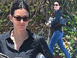 West Hollywood, CA - Courteney Cox has her hands full after rug shopping. Courteney looks comfortable in a black button up, blue jeans, and sandals as s he carries her new purchase down the street.\nAKM-GSI          June 2, 2016\nTo License These Photos, Please Contact :\nMaria Buda\n(917) 242-1505\nmbuda@akmgsi.com\nsales@akmgsi.com\nor \nMark Satter\n(317) 691-9592\nmsatter@akmgsi.com\nsales@akmgsi.com
