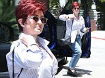 *EXCLUSIVE* Beverly Hills, CA - A somber and casually dressed Sharon Osbourne arrives for a body therapy session at Touch Massage in Beverly Hills. Sharon wore no wedding band and appeared to be in the slumps as she walked indoors. The Talk cohost, 63, recently kicked out her longtime love Ozzy. A source told Us that the rocker, 67, was allegedly having an affair with L.A.-based hairstylist Michelle Pugh and "supporting her."\n \nAKM-GSI   June  3, 2016\nTo License These Photos, Please Contact :\nMaria Buda\n(917) 242-1505\nmbuda@akmgsi.com\nsales@akmgsi.com\nor \nMark Satter\n(317) 691-9592\nmsatter@akmgsi.com\nsales@akmgsi.com