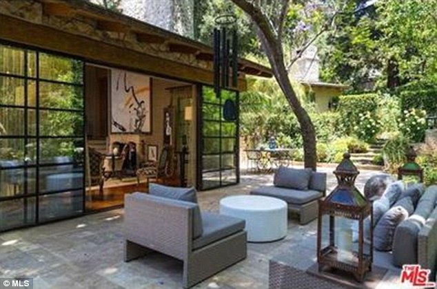 Bringing the outside in: Embracing that it is nestled into the canyon, many rooms open to patio areas which are private and very green
