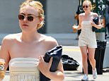 Exclusive... 52080392 Actress Dakota Fanning is spotted out and about in New York City, New York on June 3, 2016. Dakota was showing some skin during the sunny summer outing. FameFlynet, Inc - Beverly Hills, CA, USA - +1 (310) 505-9876