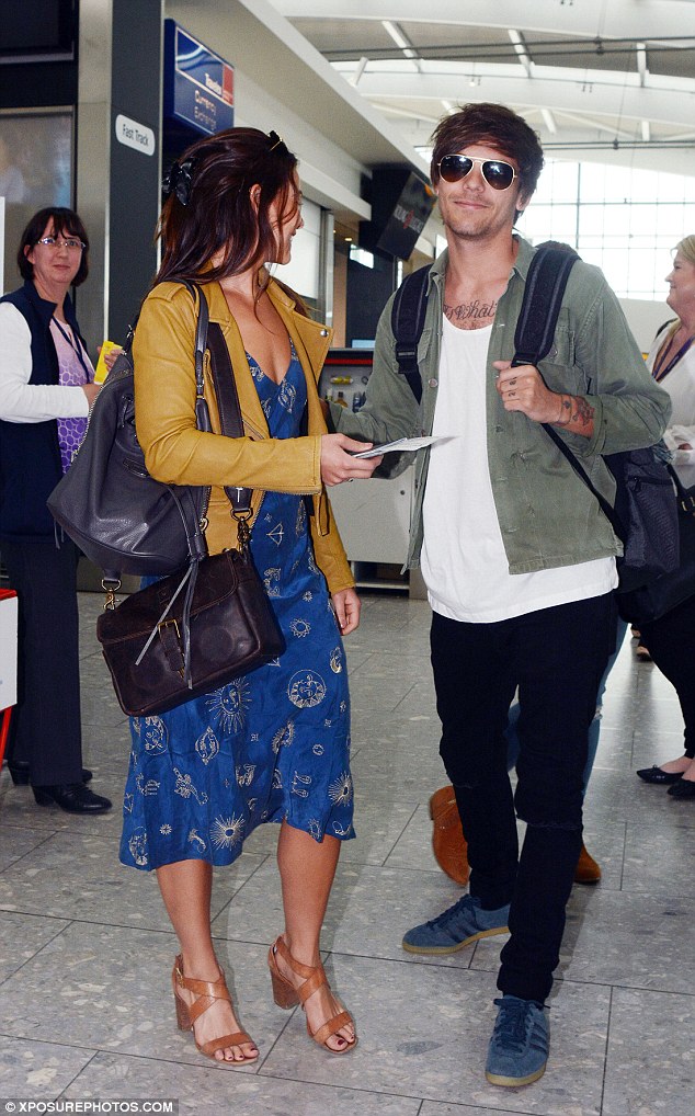 Beaming: The 1D singer seemed particularly jovial as he prepared to jet off with his gorgeous girlfriend 