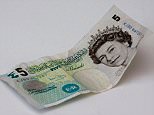 A British Five Pound / £5 Note on white background