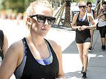 EXCLUSIVE TO INF.
June 3, 2016: Singer Ellie Goulding shows off her fit figure while posing with friends and then taking a walk after working out at Barry's Bootcamp in Miami, Florida. 
Mandatory Credit: INFphoto.com Ref: infusmi-11/13