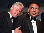 WASHINGTON, :  US President Bill Clinton leans on former world boxing heavyweight champion Muhammad Ali (R) at the National Italian American Foundation (NIAF) 25th Anniversary Awards Gala Dinner at a Washington DC hotel 28 October, 2000.  Ali and his trainer Angelo Dundee were honored with the NIAF One America award at the gathering. Founded in 1975 as a non-profit, non-partisan foundation, the NIAF works to preserve and protect Italian American heritage and culture.    AFP PHOTO/Manny CENETA (Photo credit should read MANNY CENETA/AFP/Getty Images)