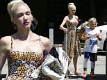 Hollywood, CA - Stylish mom Gwen Stefani brings major style to her son Zuma's basketball game on Saturday. The 46-year-old mother of three is wearing a leopard print pin up style dress with her signature red lip. By her side, Gwen carries a fuzzy Chanel clutch that adds a pop of color to compliment her makeup. Gwen keeps it comfy with her shoes wearing flip flops that are a curveball to her polished ensemble. Zuma is seen hanging out in his uniform while waiting for his superstar mom to take him home. \n  \nAKM-GSI       June 4, 2016\nTo License These Photos, Please Contact :\nMaria Buda\n(917) 242-1505\nmbuda@akmgsi.com\nsales@akmgsi.com\nMark Satter\n(317) 691-9592\nmsatter@akmgsi.com\nsales@akmgsi.com