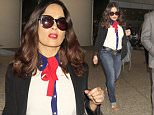 EXCLUSIVE: Salma Hayek arrives in LA amidst reports she tried to make her husband think she was having an affair to save a puppy.  The Mexican-American film actress was seen in a patriotic red, white & blue outfit.  Hayek was seen wearing blue jeans a white & blue blouse with a red scarf.\n\nPictured: Salma Hayek\nRef: SPL1295504  040616   EXCLUSIVE\nPicture by: Sharky/Poilite Paparazzi/Splash\n\nSplash News and Pictures\nLos Angeles: 310-821-2666\nNew York: 212-619-2666\nLondon: 870-934-2666\nphotodesk@splashnews.com\n