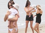 EXCLUSIVE PICTURES \n\nJun 6 2016\n\nBrian Jungwirth shows off her post-baby body in a white string bikini as she takes her baby Freddie Tomlinson on his first day out at the beach on Monday afternoon.\n\nBrian took her and Louis Tomlinson's son for his first paddle in the waves at Malibu Beach, before she, her mother and a friend went for lunch at Malibu Pier.\n\nCredit Line Must Read: No Credit\n\nPlease Agree Terms Before Use