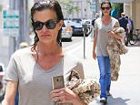 Picture Shows: Janice Dickinson  June 06, 2016\n \n Former model Janice Dickinson got her hair done in Beverly Hills, California. She was wearing a simple beige t-shirt with jeans, and left the salon with wet hair. \n \n Non-Exclusive\n UK RIGHTS ONLY\n \n Pictures by : FameFlynet UK © 2016\n Tel : +44 (0)20 3551 5049\n Email : info@fameflynet.uk.com