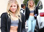 Picture Shows: Chloe Grace Moretz  June 07, 2016\n \n Actress Chloe Grace Moretz stops by an office for a meeting in Los Angeles, California. Chloe was showing off her toned abs in a sports bra and gym leggings.\n \n Non Exclusive\n UK RIGHTS ONLY\n \n Pictures by : FameFlynet UK © 2016\n Tel : +44 (0)20 3551 5049\n Email : info@fameflynet.uk.com