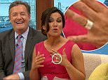 ****Ruckas Videograbs****  (01322) 861777
*IMPORTANT* Please credit ITV for this picture.
08/06/16
Good Moring Britain - ITV1
Grabs from this morning's show which saw presenter Susanna Reid being forced to deny that she has got married after viewers spotted that she was wearing a ring on her wedding finger. She did however fuel sp[eculation she might be in a relationship when she pulled up her co-host Piers Morgan for telling viewers she is single. Seaking about research which shows married people are more likely to survive a heart attack than poeple who are single, Piers asked "If you're genuinely single likr Susanna, does that mean you're at more risk of dying" to which Susanna told Piers "Can I just say, you don't actually know anything about my relationship status" but added she wasn't wishing to discuss it with the nation.
Office  (UK)  : 01322 861777
Mobile (UK)  : 07742 164 106
**IMPORTANT - PLEASE READ** The video grabs supplied by Ruckas Pictures always remain the copyright o