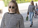 9 Jun 2016  - London  - UK\n*** EXCLUSIVE ALL ROUND PICTURES ***\nGame of Thrones star Sophie Turner dressed in casual attire with ripped jeans, a striped top and sunglasses goes for a stroll in the sun in North London. \nBYLINE MUST READ : XPOSUREPHOTOS.COM\n***UK CLIENTS - PICTURES CONTAINING CHILDREN PLEASE PIXELATE FACE PRIOR TO PUBLICATION ***\n**UK CLIENTS MUST CALL PRIOR TO TV OR ONLINE USAGE PLEASE TELEPHONE  442083442007