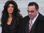 NEWARK, NJ - MARCH 04:  Teresa Giudice and Joe Giudice are seen outside a federal criminal court, where they face mortgage and bankruptcy fraud charges on  March 4, 2014 in Newark, New Jersey.  (Photo by Alo Ceballos/GC Images