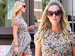 June 15, 2016: Pregnant Nicky Hilton glowing and pretty in a floral dress is seen enjoying a Starbuck's coffee, as she walks down Broadway in New York City.\nMandatory Credit: Cepeda/INFphoto.com Ref: infusny-259