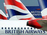 The British Airways logo is seen between tailfins of aircraft parked at Heathrow Airport, west of London, on May 24, 2010. 
Thousands of air travellers faced renewed travel chaos on Monday as British Airways cabin crew launched a five-day strike, after last-ditch negotiations collapsed. 

AFP PHOTO/Adrian Dennis (Photo credit should read ADRIAN DENNIS/AFP/Getty Images)