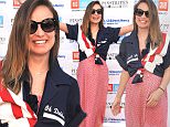 OVERLAND PARK, KS - JUNE 18:  Olivia Wilde attends the Big Slick "Red, White & Bowl" at Pinstripes during the 2016 Big Slick Celebrity Weekend on June 18, 2016 in Overland Park, Kansas.  (Photo by Fernando Leon/Getty Images)