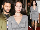 West Hollywood, CA - Bella Hadid and boyfriend, The Weeknd are spotted leaving a dinner date at famous Italian eatery, Madeo Restaurant. Bella looks sexy in a low plunging gray wrap dress while her boyfriend keeps it casual in a Supreme tee, jeans, and olive bomber.\nAKM-GSI       June 17, 2016\nTo License These Photos, Please Contact :\nMaria Buda\n(917) 242-1505\nmbuda@akmgsi.com\nsales@akmgsi.com\nor \nMark Satter\n(317) 691-9592\nmsatter@akmgsi.com\nsales@akmgsi.com\nwww.akmgsi.com