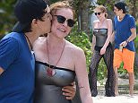 *PREMIUM EXCLUSIVE* Port Louis, Mauritius - Lindsay Lohan has the look of love as she smiles in total bliss during a romantic stroll with fiancee Egor Tarabasov.  Egor gave Lindsay a big kiss on the cheek while the two enjoyed the beach scenery.  Lindsay donned a silver one-piece bathing suit with mesh flares for the relaxing day on the beach. *Shot on May 14, 2016* 
AKM-GSI     June 20, 2016
To License These Photos, Please Contact :
Maria Buda
(917) 242-1505
mbuda@akmgsi.com
sales@akmgsi.com
or 
Mark Satter
 (317) 691-9592
 msatter@akmgsi.com
 sales@akmgsi.com
 www.akmgsi.com