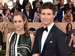 Hannah Bagshawe, left, and Eddie Redmayne arrive at the 22nd annual Screen Actors Guild Awards at the Shrine Auditorium & Expo Hall on Saturday, Jan. 30, 2016, in Los Angeles. (Photo by Jordan Strauss/Invision/AP)