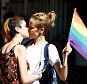 LGBT rights activists kiss during a transgender pride parade which was banned by the governorship, in central Istanbul, Turkey, June 19, 2016. REUTERS/Osman Orsal