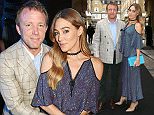 Director Guy Ritchie and Jacqui Ainsley pose for photographers upon arrival at the Old Vic Summer Gala in London, Monday, June 27, 2016. (Photo by Joel Ryan/Invision/AP)