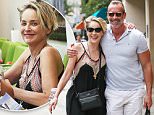 Beverly Hills, CA - Sharon Stone enjoys a pampering session at Beverly Hills Nail Design in Beverly Hills. Afterwards, Sharon shares a laugh with a unknown muscled male friend as they walk to the parking garage arm in arm with smiles ear to ear.\nAKM-GSI    June  28, 2016\nTo License These Photos, Please Contact :\nMaria Buda\n(917) 242-1505\nmbuda@akmgsi.com\nsales@akmgsi.com\nor \nMark Satter\n(317) 691-9592\nmsatter@akmgsi.com\nsales@akmgsi.com\nwww.akmgsi.com