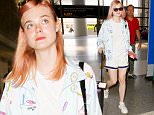 July 12, 2016: Elle Fanning sports pink hair and a tennis patterned jacket with white shorts and tee as she departs LAX Airport, Los Angeles, CA.\nMandatory Credit: INFphoto.com Ref.: inf-00