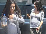 EXCLUSIVE: Mila Kunis shows off her ever expanding baby bump as she leaves Joans On Third in Studio City, Ca\n\nPictured: Mila Kunis\nRef: SPL1317103  120716   EXCLUSIVE\nPicture by: London Entertainment /Splash\n\nSplash News and Pictures\nLos Angeles: 310-821-2666\nNew York: 212-619-2666\nLondon: 870-934-2666\nphotodesk@splashnews.com\n
