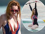 05.July.2016 - Mauritius Island - Mauritius
**STRICTLY AVAILABLE FOR UK AND GERMANY USE ONLY**
** EXCLUSIVE ALL ROUND PICTURES **
Mauritius Island, Mauritius - Lindsay Lohan and fiance Egor Tarabasov attempt to catch fresh fish while  having a blast in the Mauritius Island.  Lohan, 30, showed off her slender figure in a navy blue and red one-piece swimsuit.
BYLINE MUST READ : AKM-GSI-XPOSURE
***UK CLIENTS - PICTURES CONTAINING CHILDREN PLEASE PIXELATE FACE PRIOR TO PUBLICATION ***
*UK CLIENTS MUST CALL PRIOR TO TV OR ONLINE USAGE PLEASE TELEPHONE 0208 344 2007*