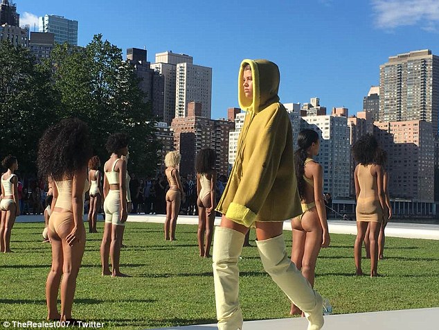 Taking the heat: Sophia Richie, 18, braved a hot New York day in a coat as she debuted for Kanye West's fashion line with a walk down the runway