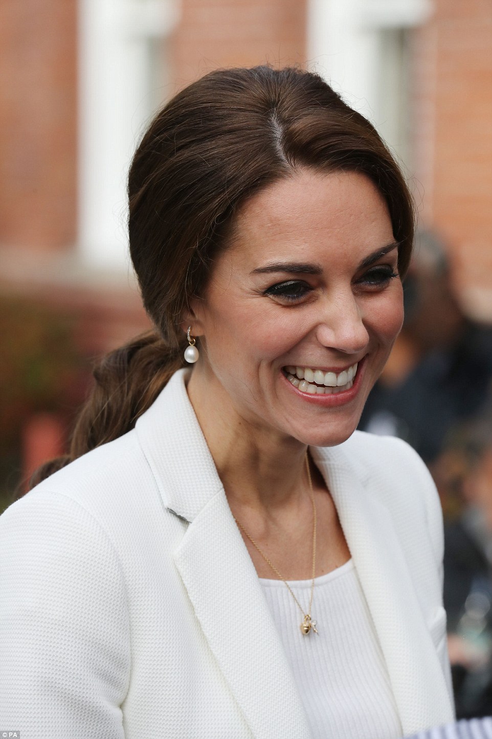 The Duchess beamed as she arrived in Victoria, Canada, looking as chic as ever in a crisp white outfit and minimalist jewellery