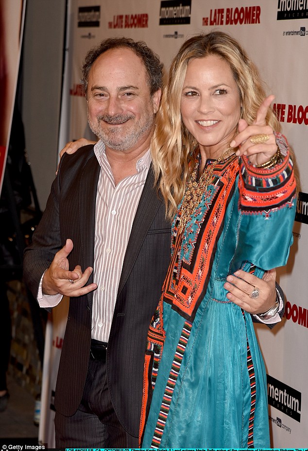 Look at my hand! Maria Bello flashed a gold ring on Monday night when at the Late Bloomer premiere at iPic in Los Angeles; here she is posed with director Kevin Pollak