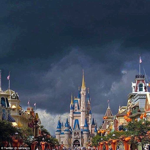 Walt Disney World in Orlando (pictured on Thursday with Matthew closing in) has closed