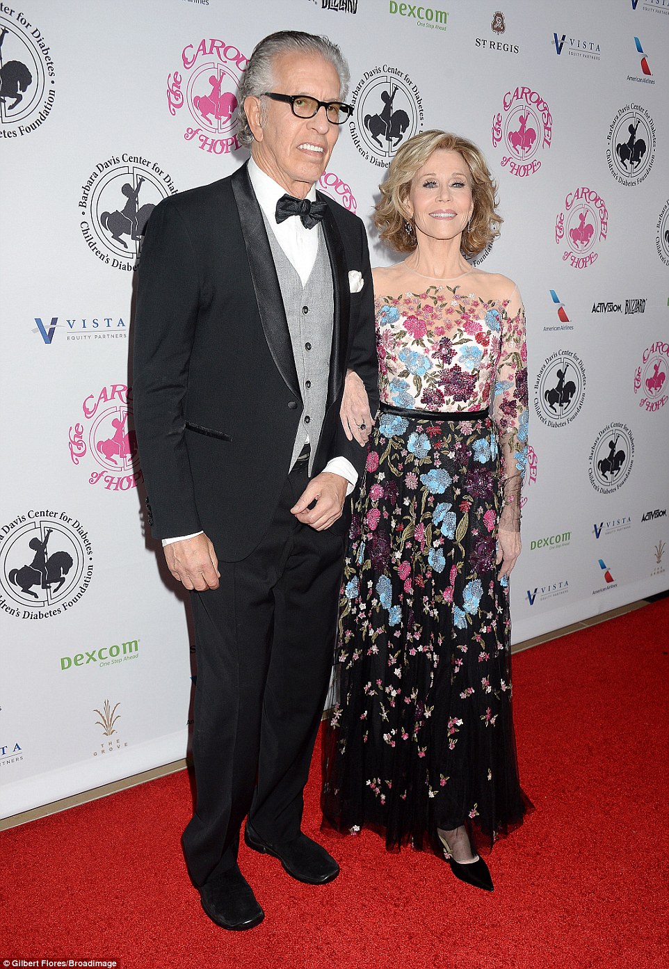 Jane Fonda arrived on the arm of 74-year-old music producer Richard Perry