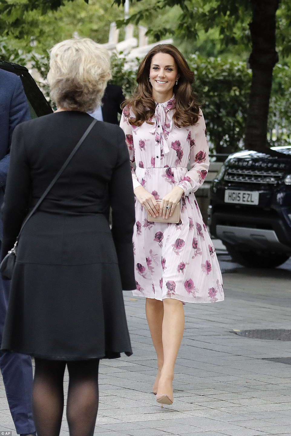 The Duchess's dress by Kate Spade features a pussy bow feature and light pleating  