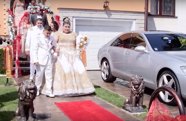 The bride leaves her house in Slovakia in her expensive dress for her special day 