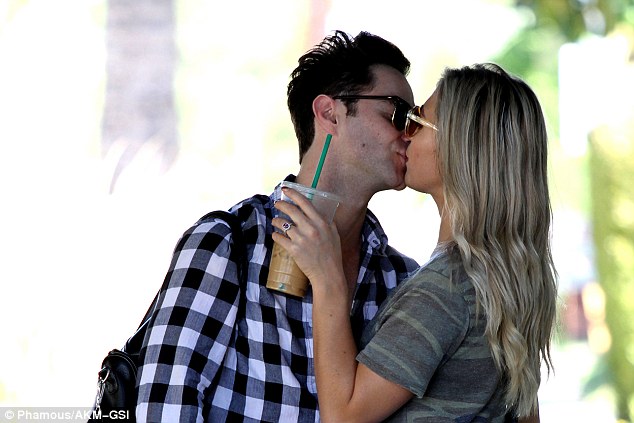Hugs and kisses! Emma Slater and Sasha Farber passionately kissed during an outing in Los Angeles on Sunday, just days after becoming engaged 